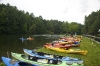 Array of kayaks along the beach